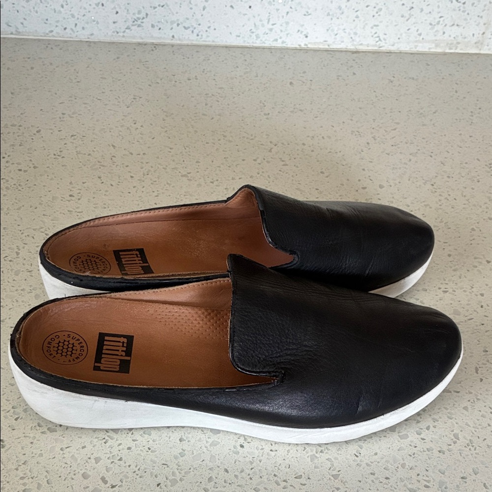 Fitflop Black Leather Slip-On Sneakers with White Soles